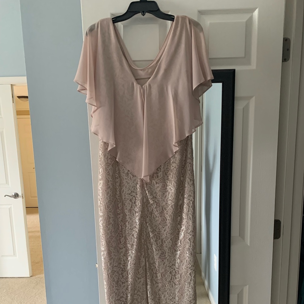 Dress worn once for my son’s wedding. Size 12. Bought new at Macys.